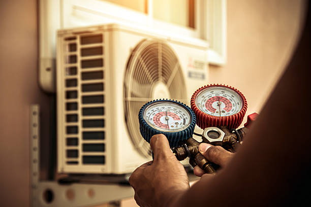 Professional Air Conditioning Service technician working in Canton, GA